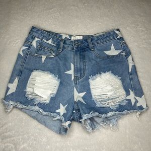 High waisted white star patterned blue jean shorts